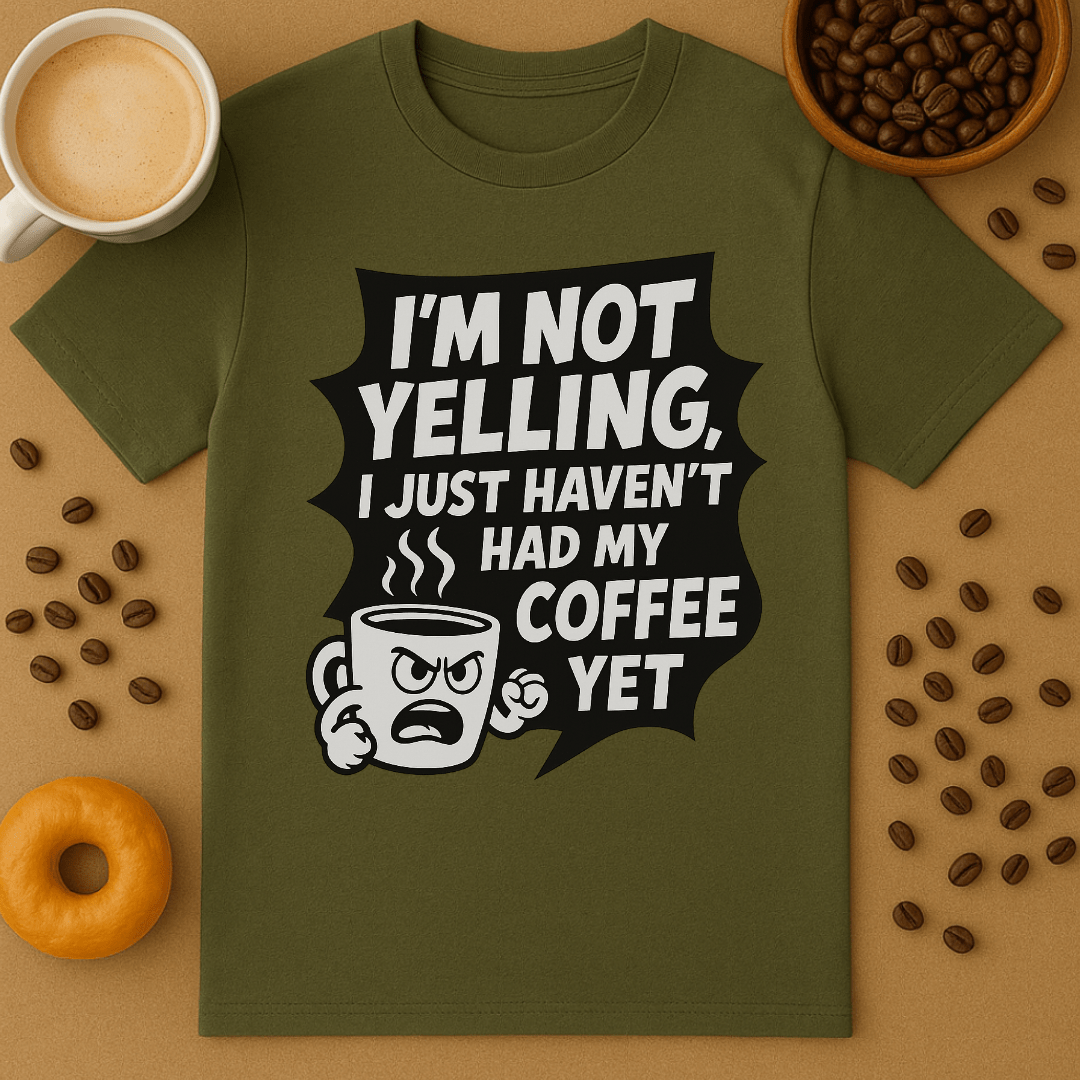 Green t-shirt with coffee-themed graphic and text, surrounded by coffee beans and a cup of coffee.